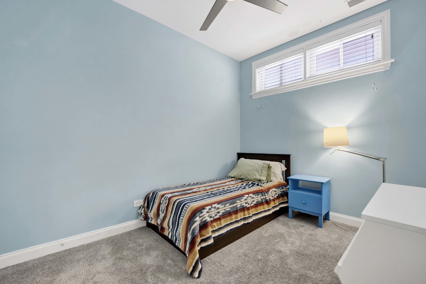 218 South Laflin Street, Unit 101 Chicago, IL 60607 - Photo 14 of 22 a bedroom with a bed and a window