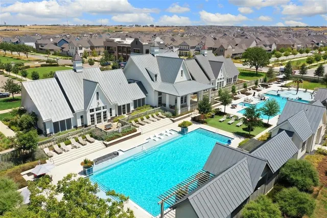an aerial view of a house with a garden