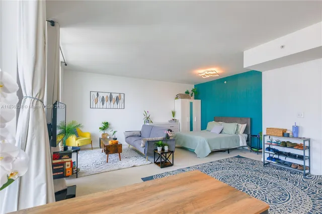 a living room with furniture and a couch