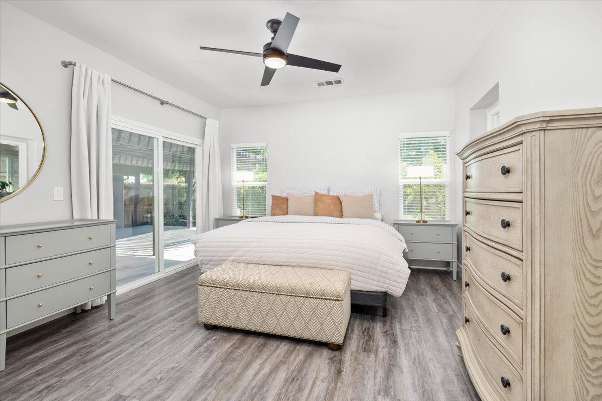 437 Silver Ridge Court Oakdale, CA 95361 - Photo 18 of 41 a bedroom with a bed and a dresser
