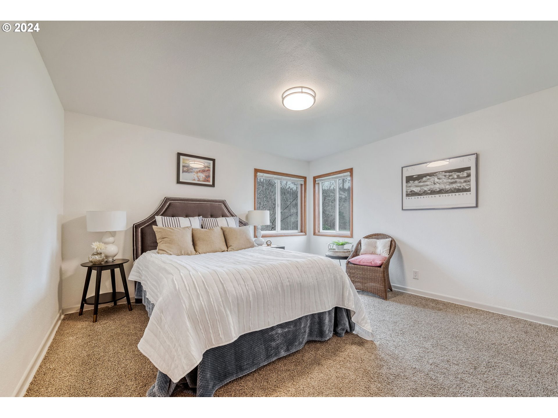 892 Sprague Street Eugene, OR 97405 - Photo 16 of 16 a bedroom with a bed and window