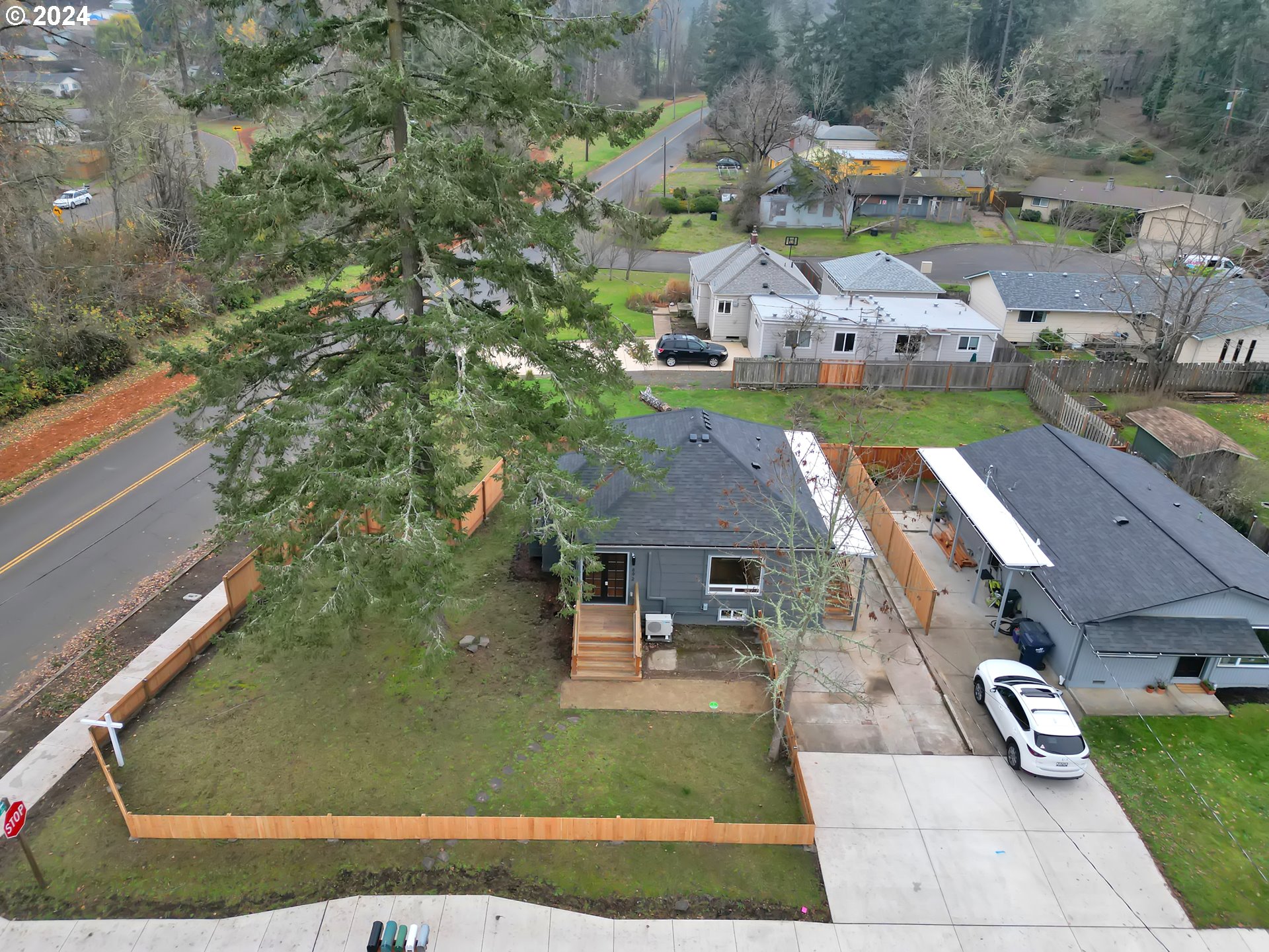 892 Sprague Street Eugene, OR 97405 - Photo 2 of 16 a view of a house with outdoor space