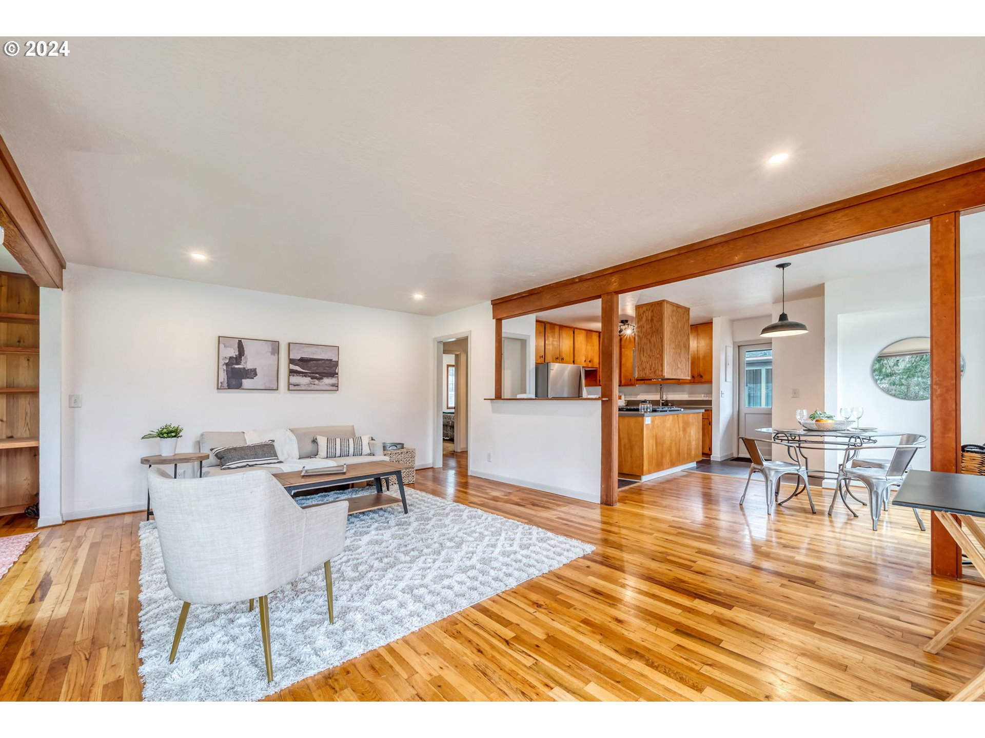 892 Sprague Street Eugene, OR 97405 - Photo 5 of 16 a living room with furniture and a table