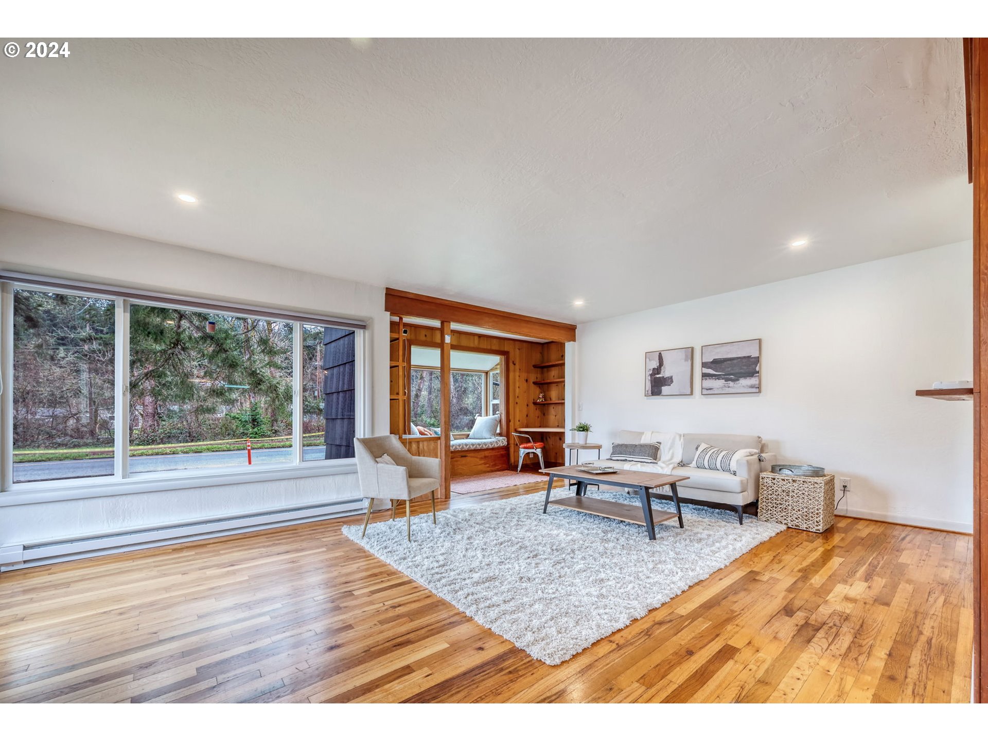 892 Sprague Street Eugene, OR 97405 - Photo 6 of 16 a living room with furniture and a table