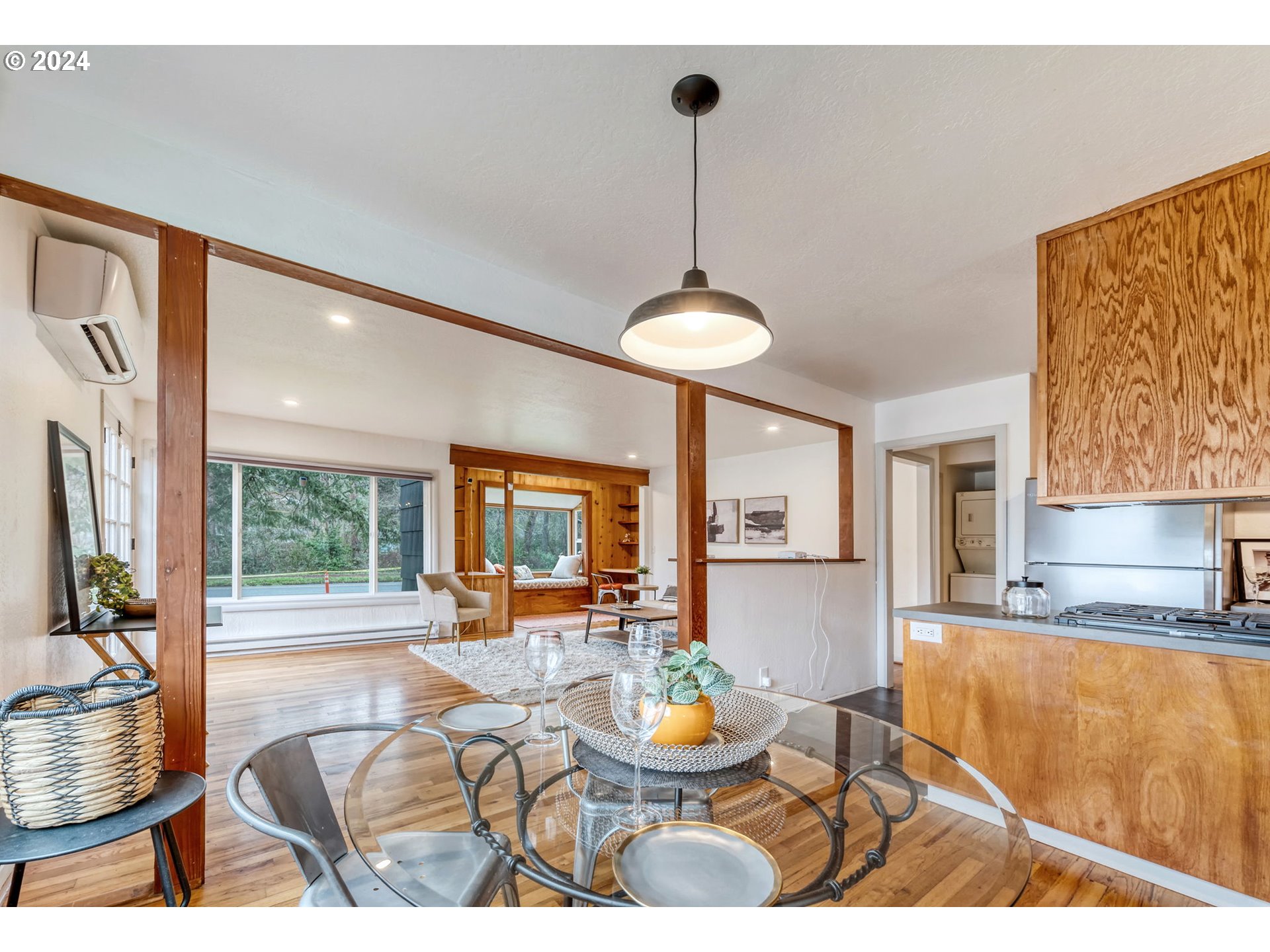 892 Sprague Street Eugene, OR 97405 - Photo 9 of 16 a living room with furniture and a chandelier