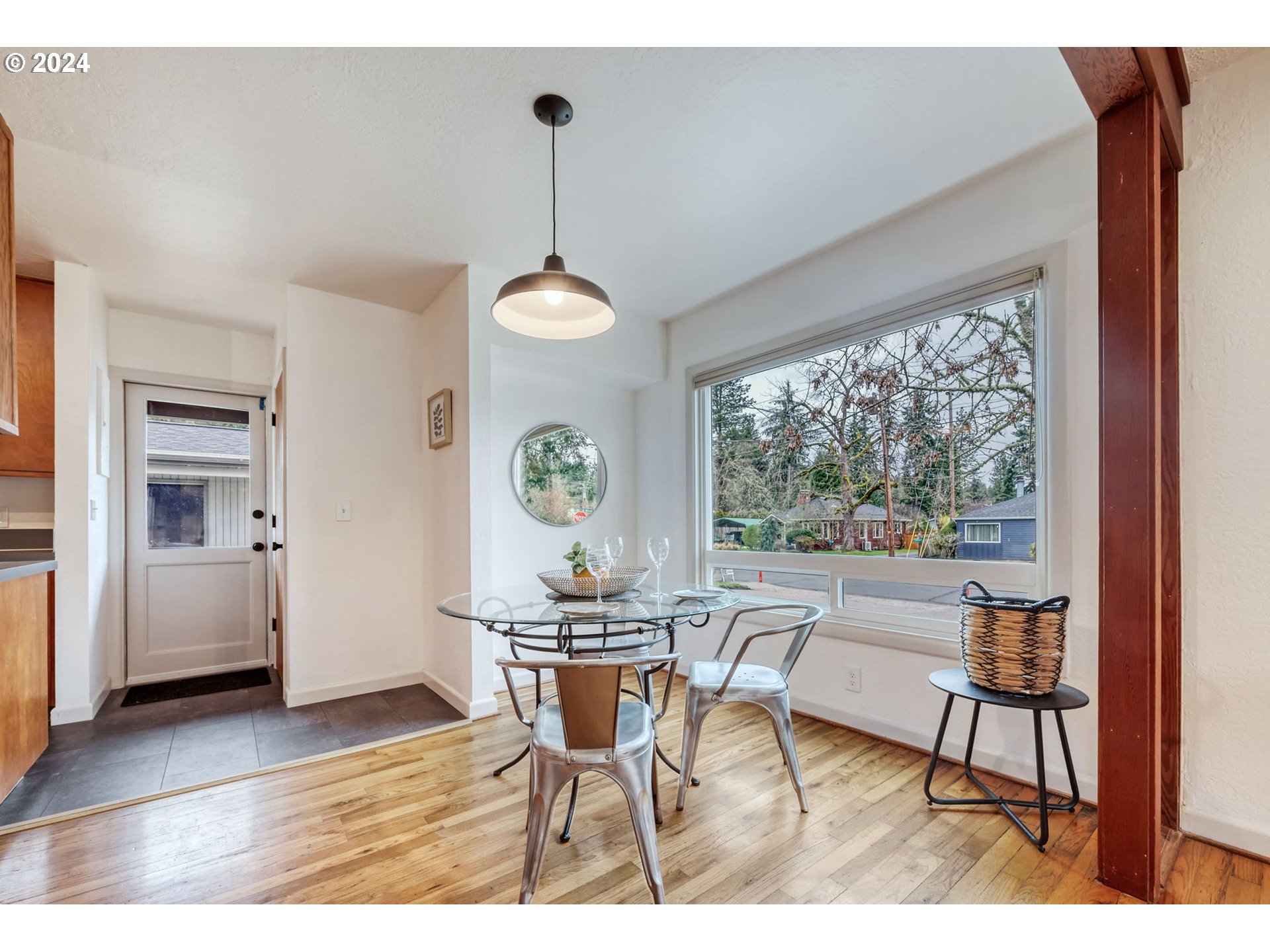 892 Sprague Street Eugene, OR 97405 - Photo 10 of 16 a view of a dining room with furniture window and outside view