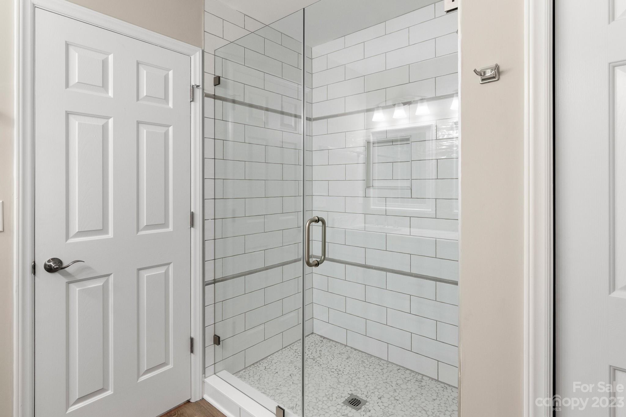 313 Faith Road Mooresville, NC 28115 - Photo 25 of 42 a bathroom with a shower