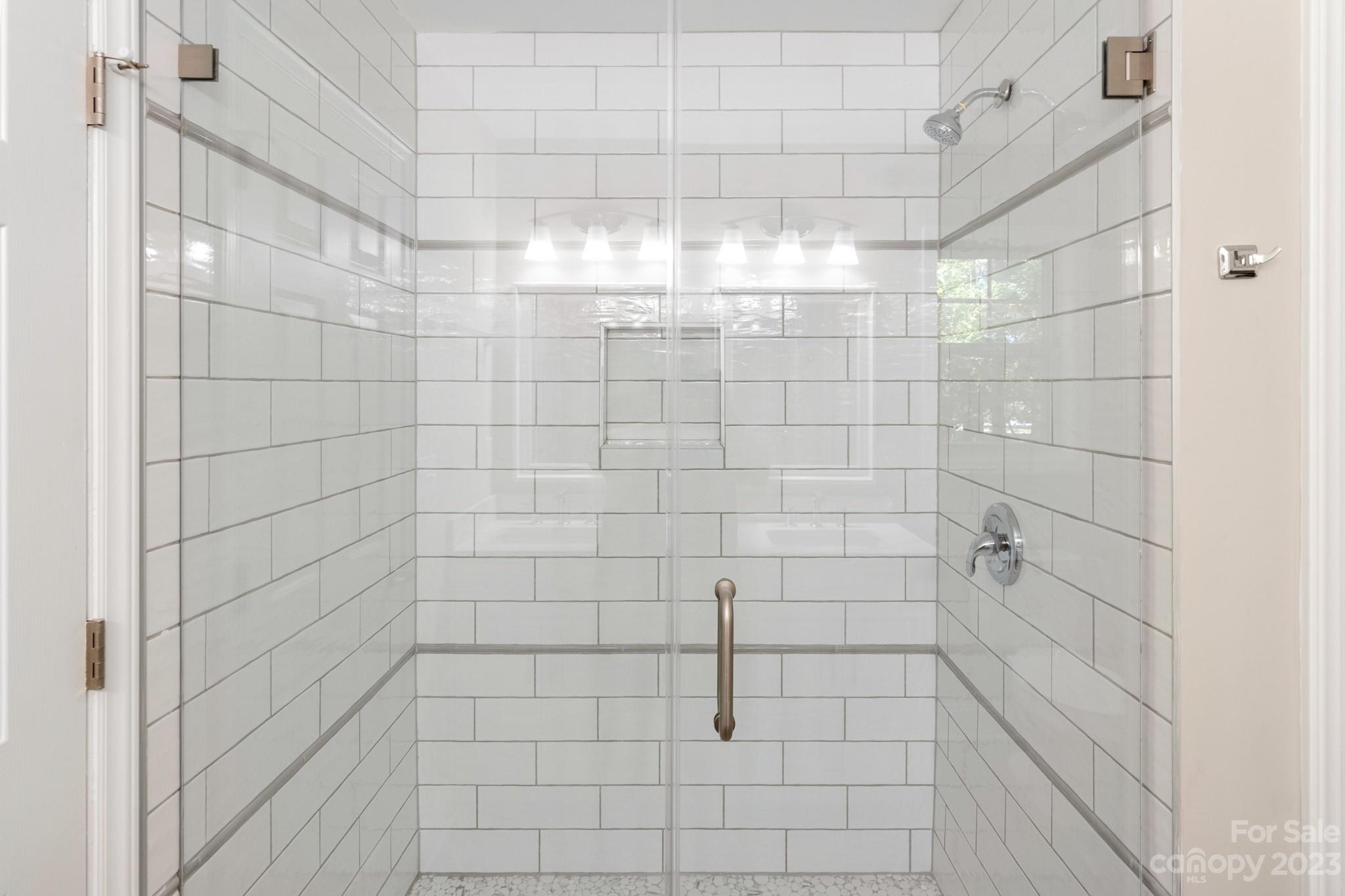 313 Faith Road Mooresville, NC 28115 - Photo 26 of 42 a bathroom with a shower