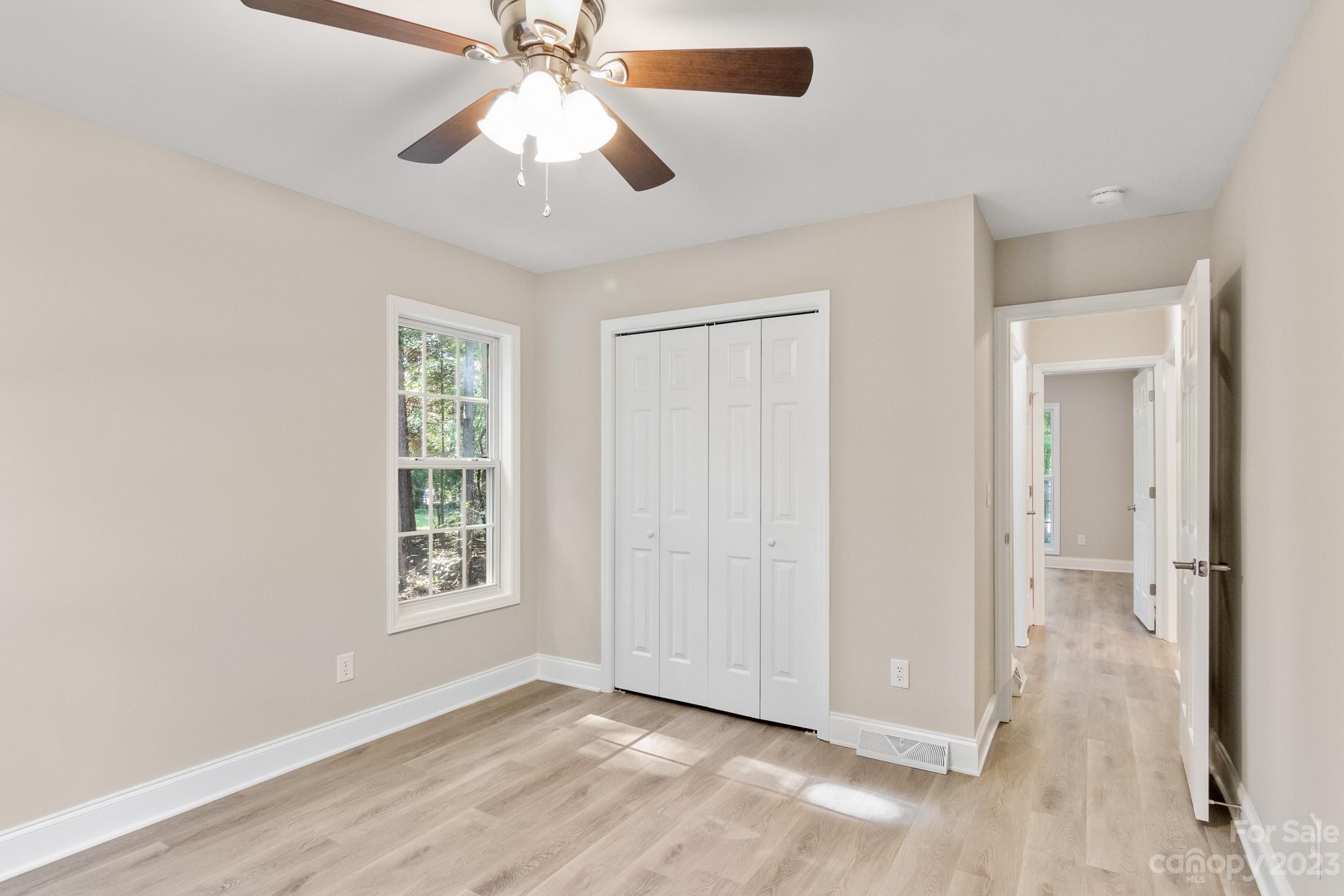 313 Faith Road Mooresville, NC 28115 - Photo 33 of 42 a view of an empty room with a window