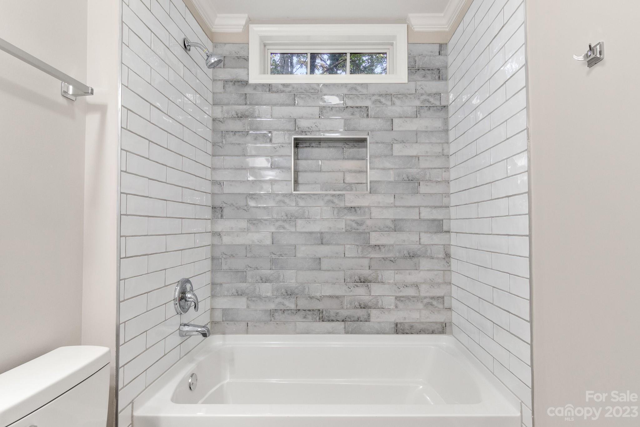 313 Faith Road Mooresville, NC 28115 - Photo 35 of 42 a bathroom with a bathtub