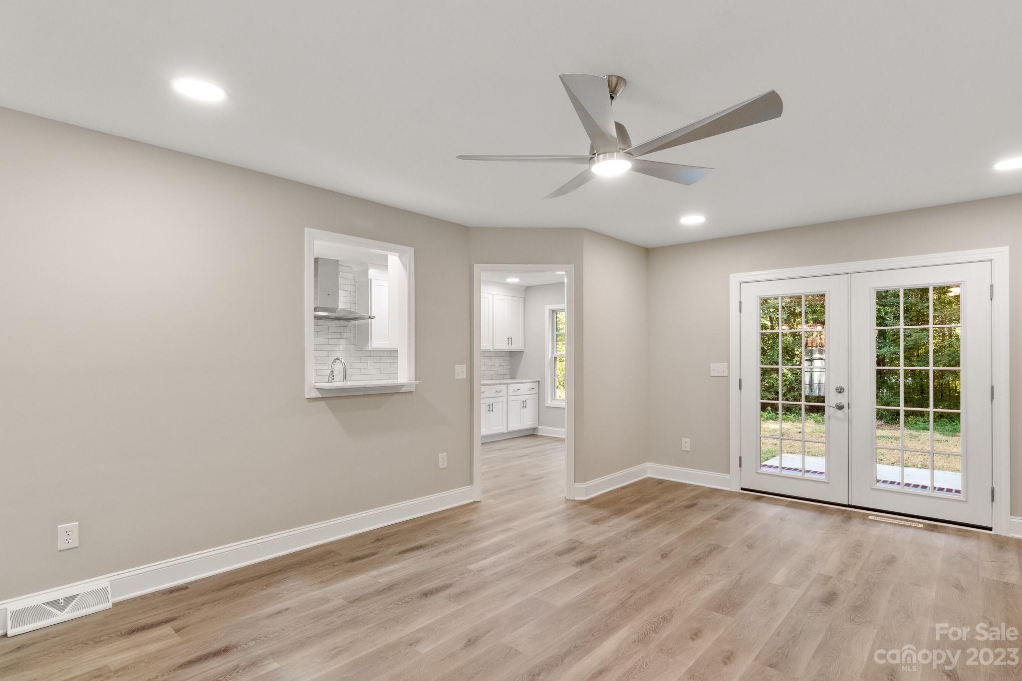 313 Faith Road Mooresville, NC 28115 - Photo 4 of 42 a view of an empty room with a window