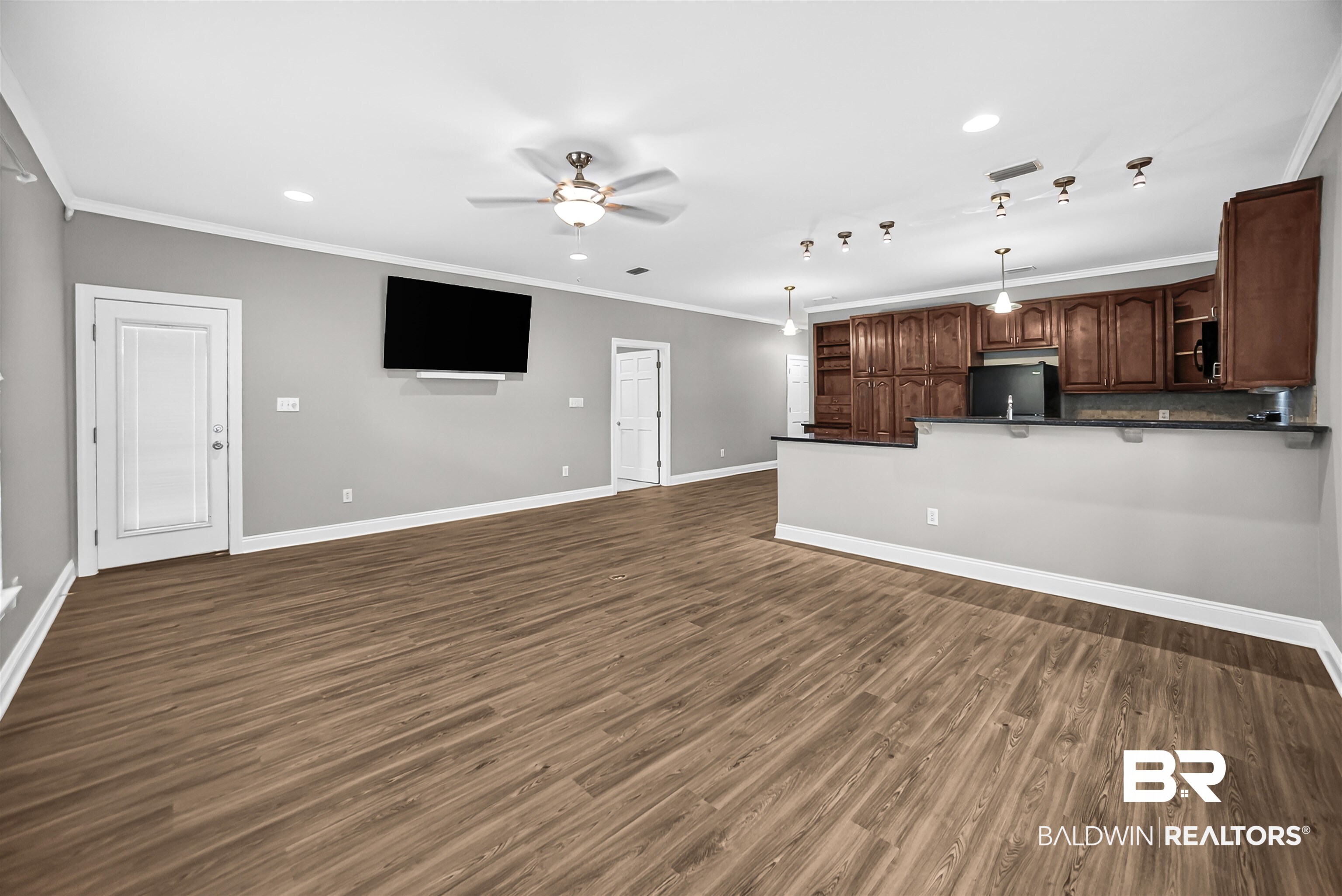 5913 Antoine Road Mobile, AL 36693 - Photo 8 of 33 Open-concept living space featuring wood-finish flooring, recessed lighting, and a ceiling fan