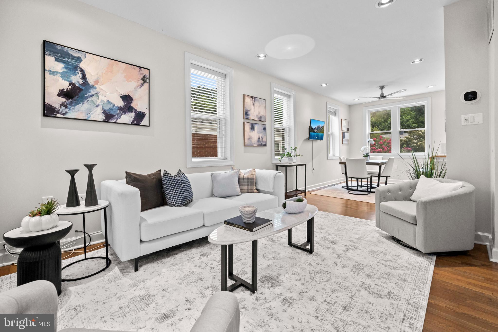 1348 Newton Street Northeast Washington, DC 20017 - Photo 1 of 31 a living room with furniture and a large window