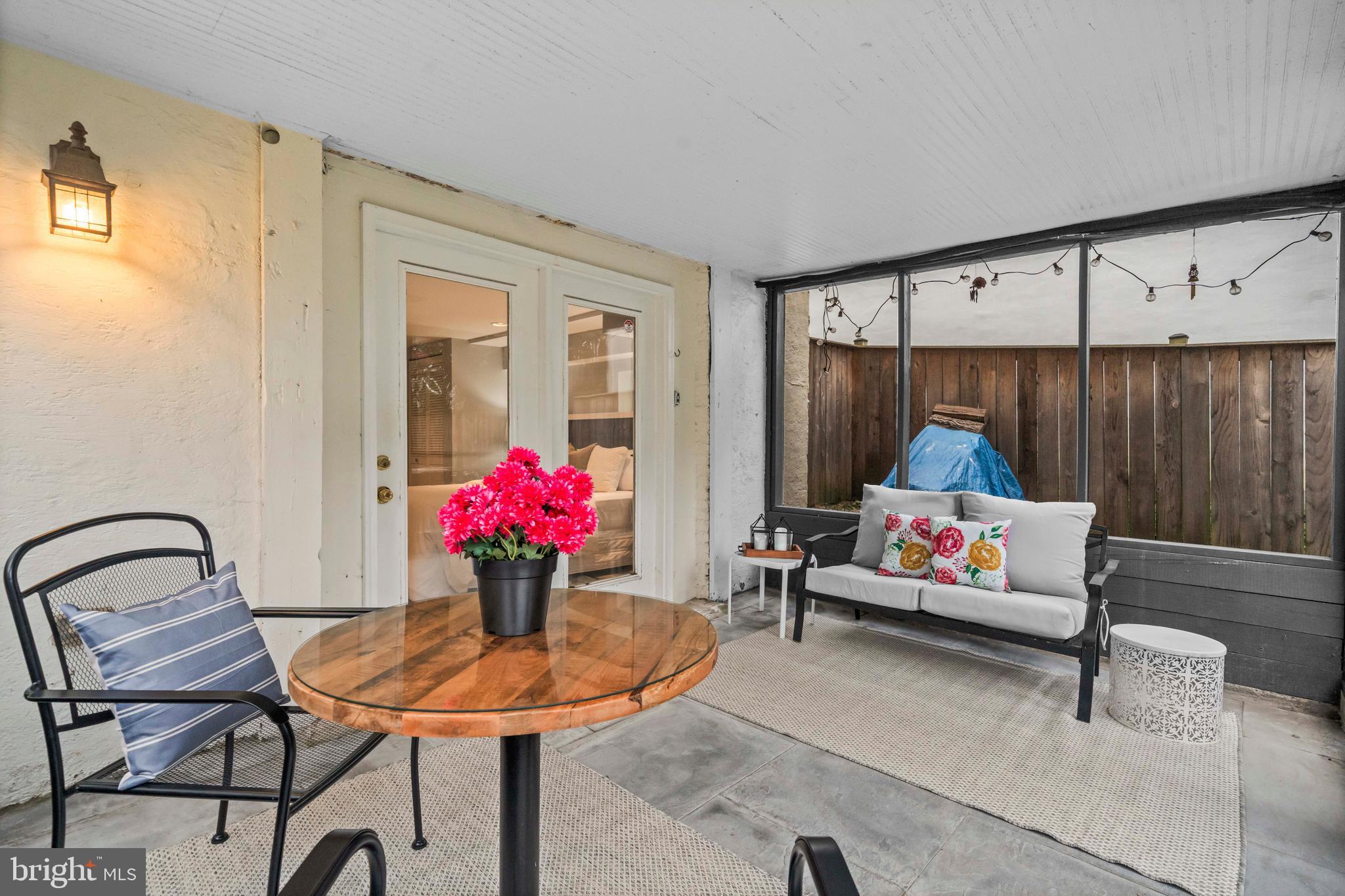 1348 Newton Street Northeast Washington, DC 20017 - Photo 22 of 31 a living room with furniture and flowers