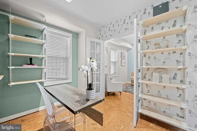 a view of a livingroom with furniture and window