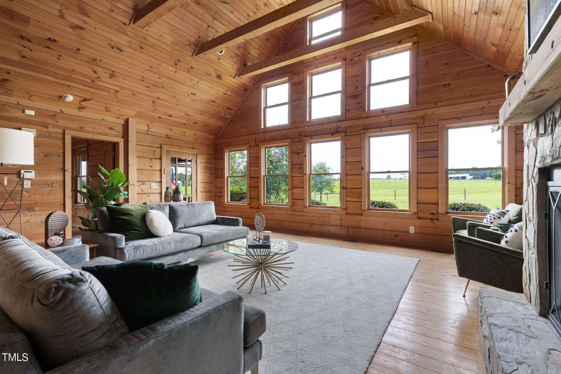 4676 Uzzle Road Rougemont, NC 27572 - Photo 12 of 74 a living room with furniture and a large window
