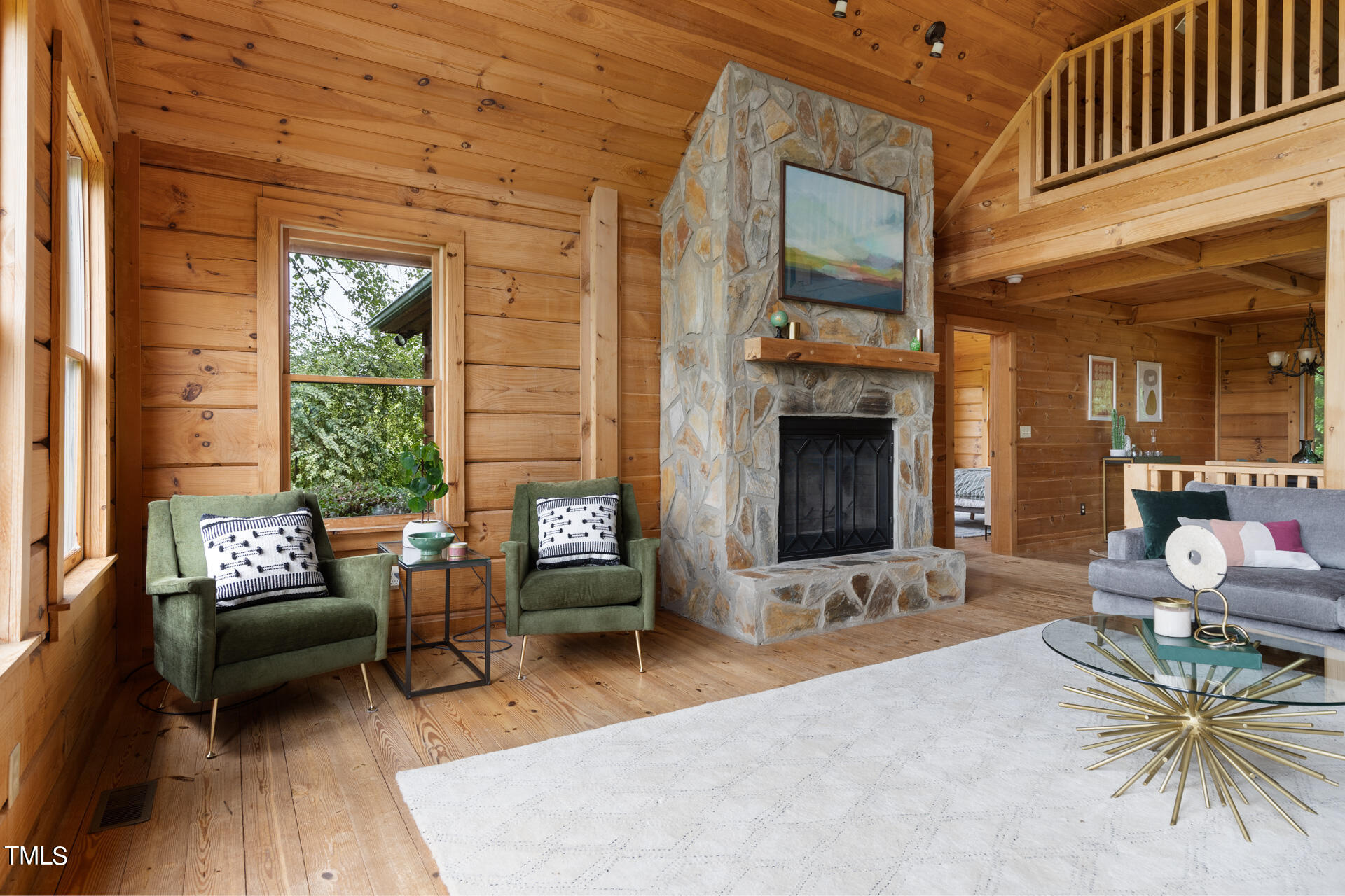 4676 Uzzle Road Rougemont, NC 27572 - Photo 13 of 74 a living room with furniture and a fireplace