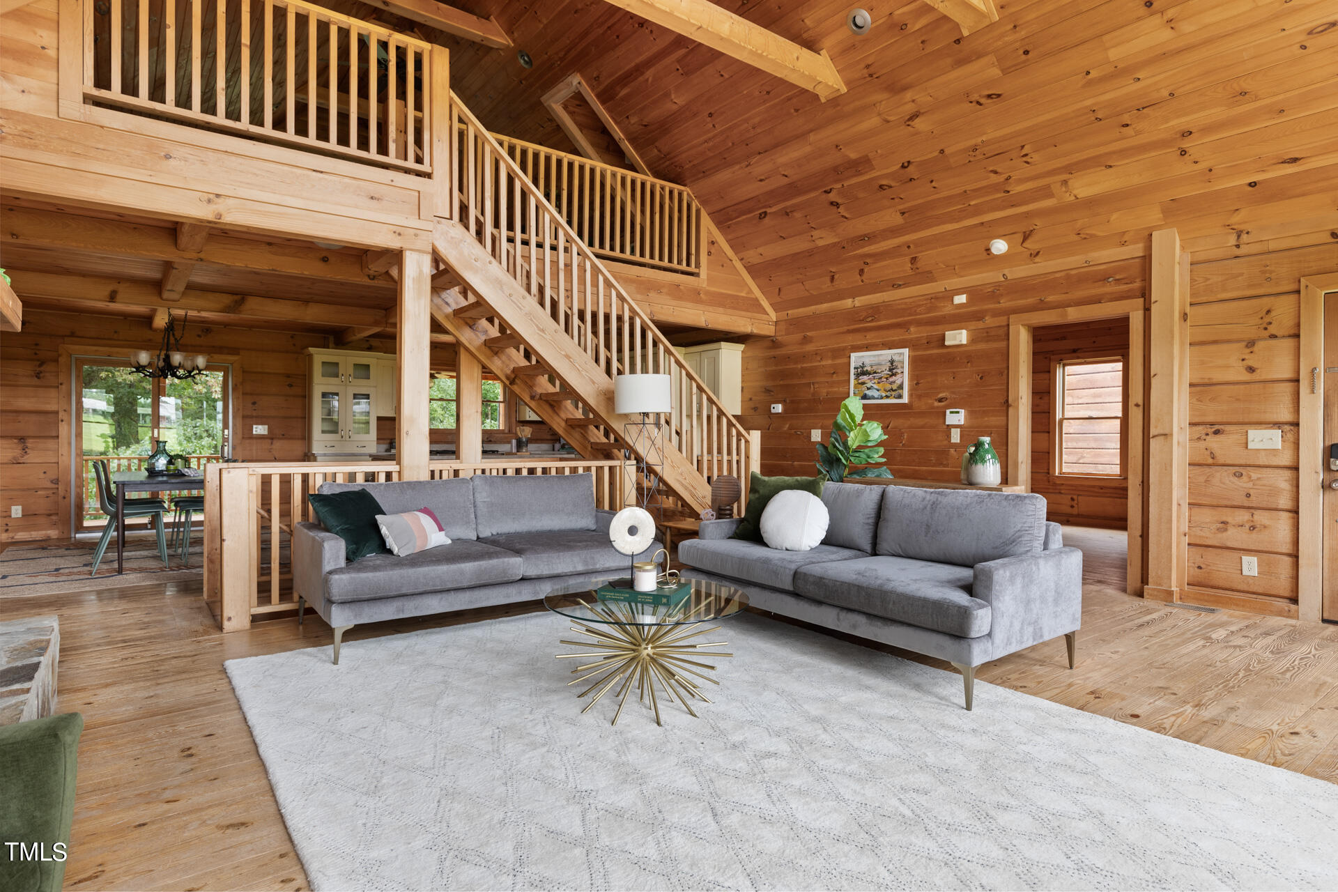 4676 Uzzle Road Rougemont, NC 27572 - Photo 14 of 74 a living room with furniture and stairs