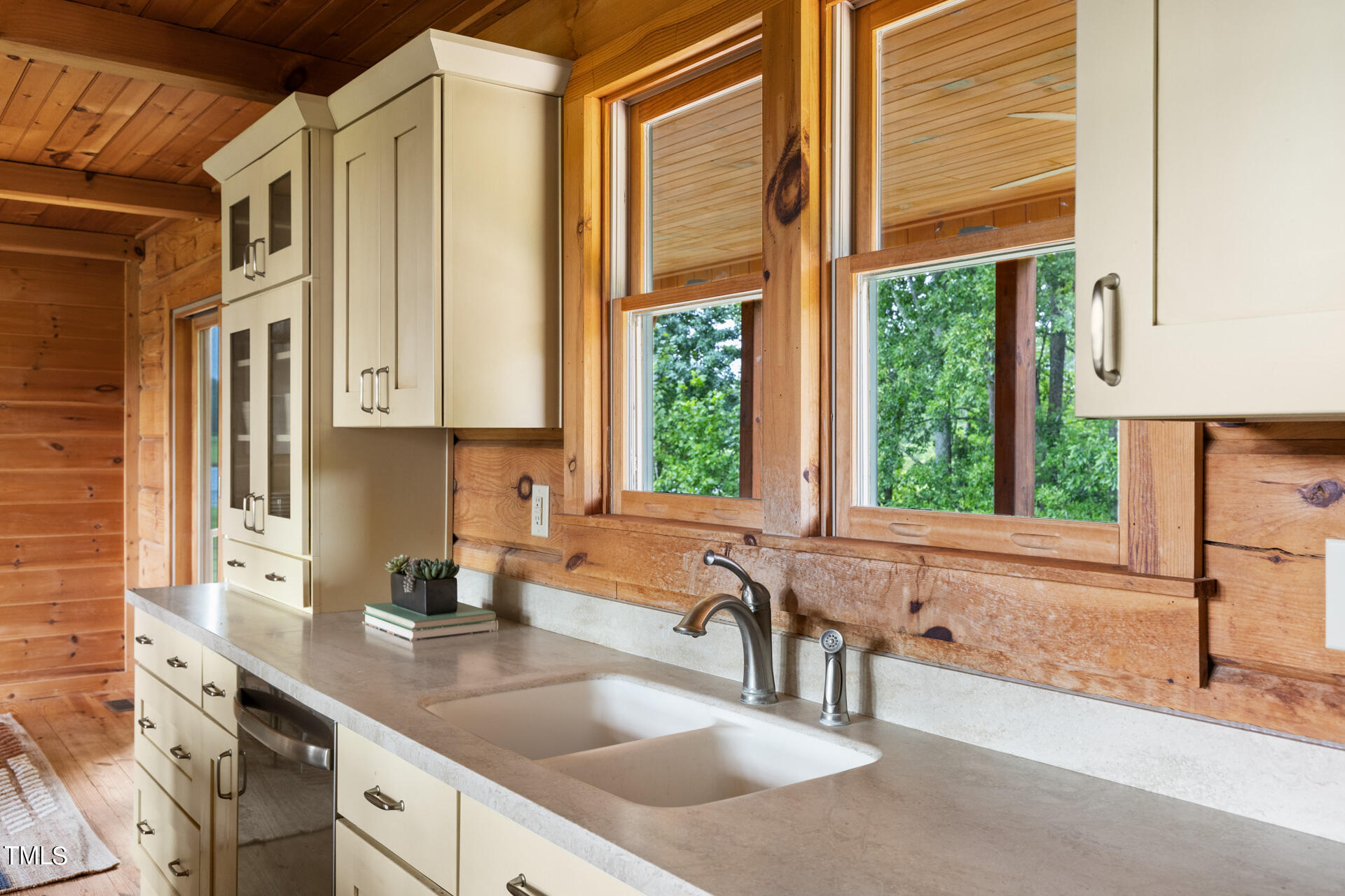 4676 Uzzle Road Rougemont, NC 27572 - Photo 26 of 74 a kitchen with granite countertop a sink and a window