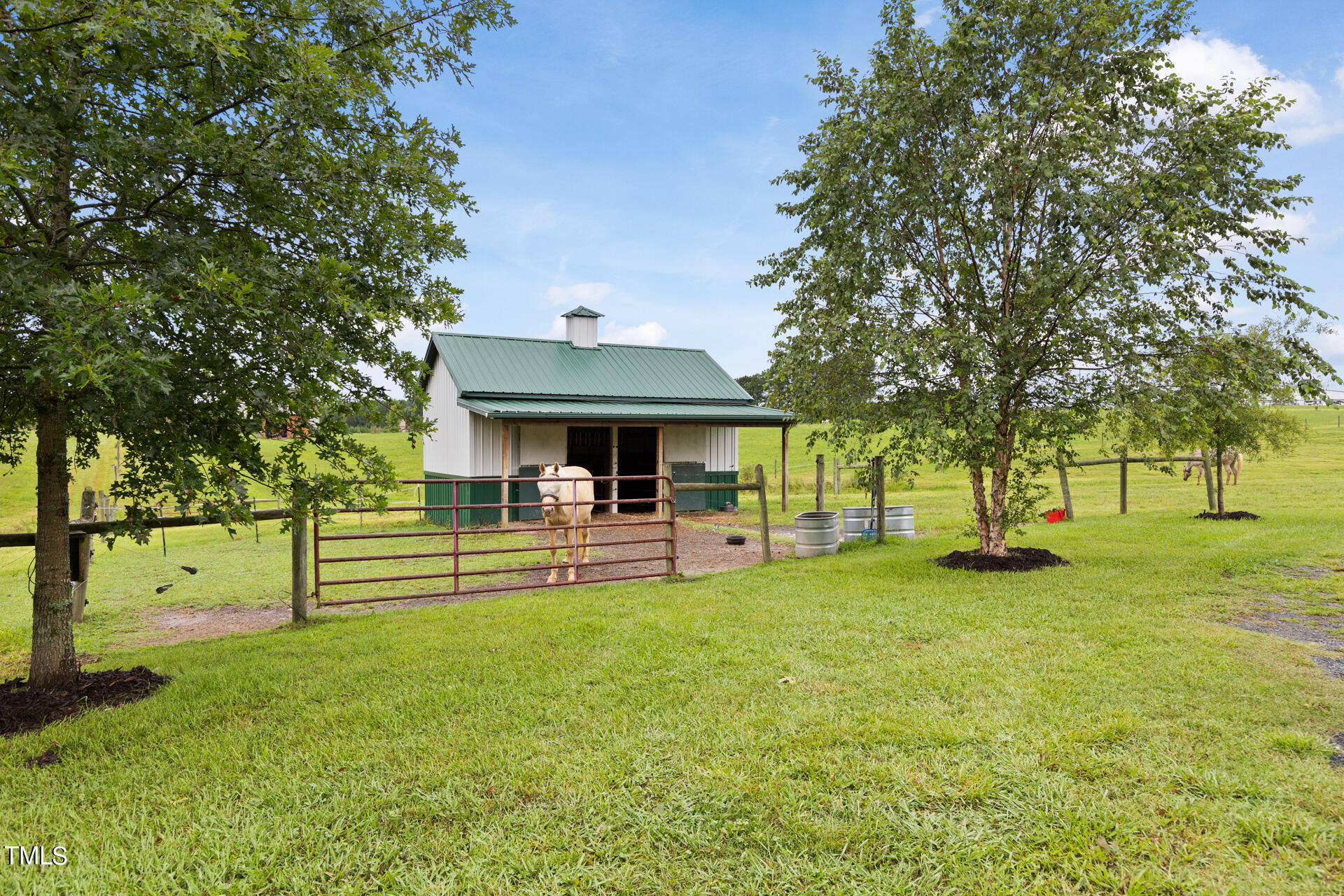 4676 Uzzle Road Rougemont, NC 27572 - Photo 61 of 74 a view of a house with swimming pool and sitting area