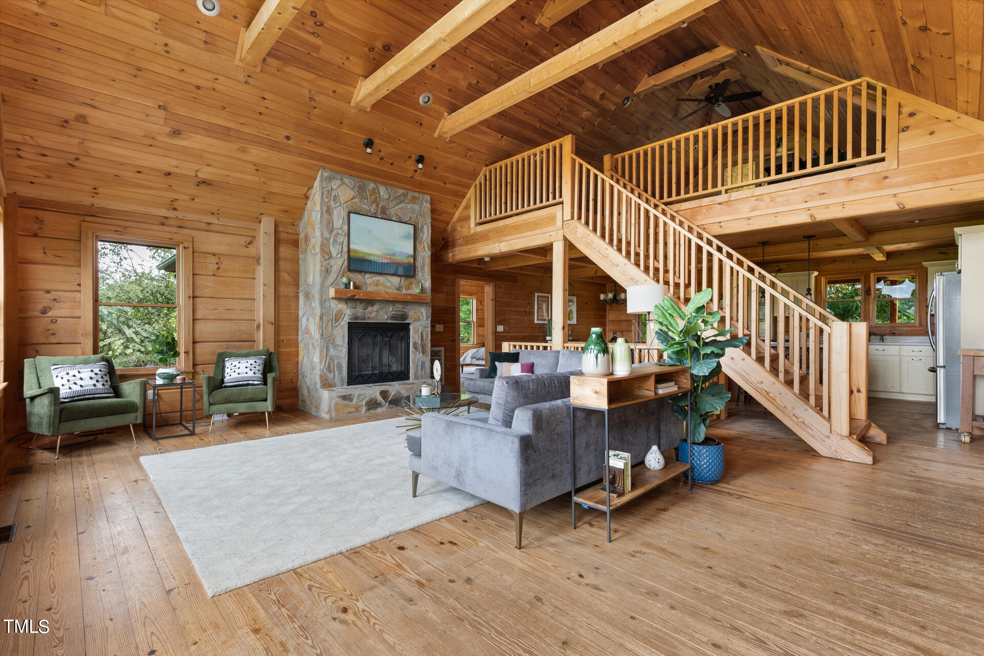 4676 Uzzle Road Rougemont, NC 27572 - Photo 10 of 74 a view of a livingroom with wooden floor and furniture