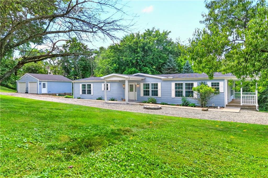 LIKE NEW!!! Spacious 3 Bedroom 2019 w/ Massive 2 Car Detached Garage on Over 1.4 Acres!Awesome 26x7 Covered Side Porch and Covered Front Porch Entry