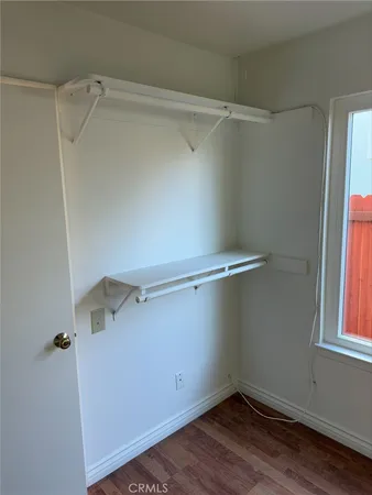 a view of a room with racks on the wall