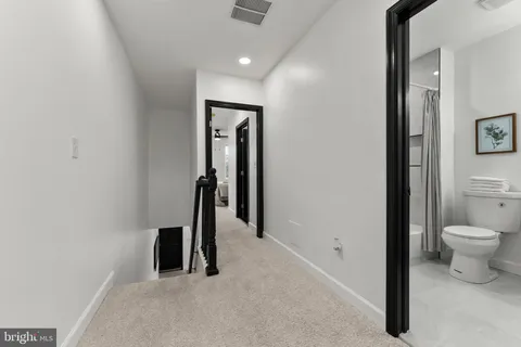 a bathroom with a toilet and a sink