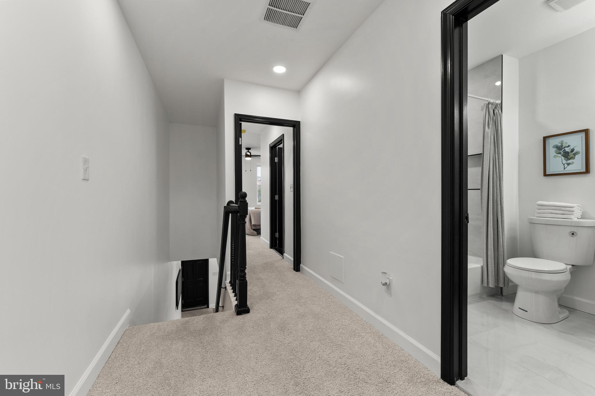 1623 Rutland Avenue Baltimore, MD 21213 - Photo 22 of 38 a bathroom with a toilet and a sink