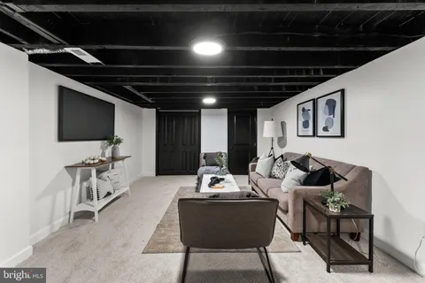 a bedroom with a bed and a walk in closet