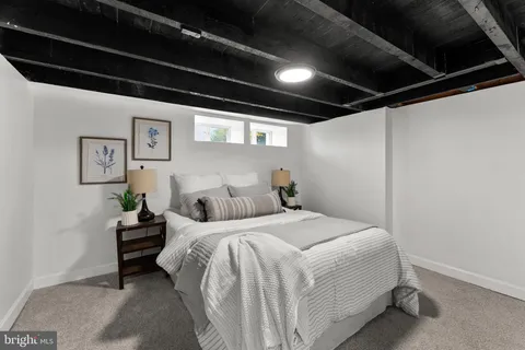 a view of a workspace with furniture