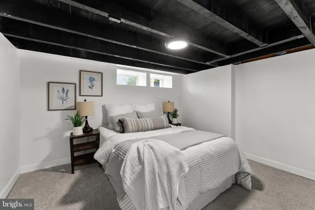 a view of a workspace with furniture