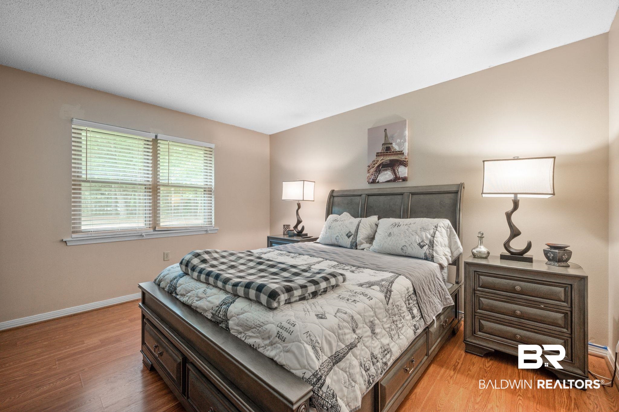 4566 McCrary Road, Unit A Semmes, AL 36575 - Photo 17 of 28 Bedroom with a textured ceiling and light hardwood / wood-style flooring