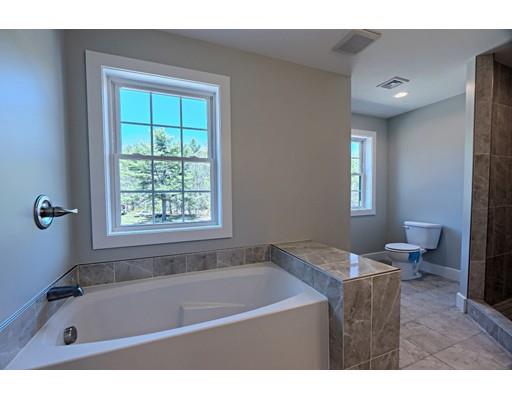 30 Depot Road Ashburnham, MA 01430 - Photo 12 of 30 a bathroom with a granite countertop tub a sink and a window