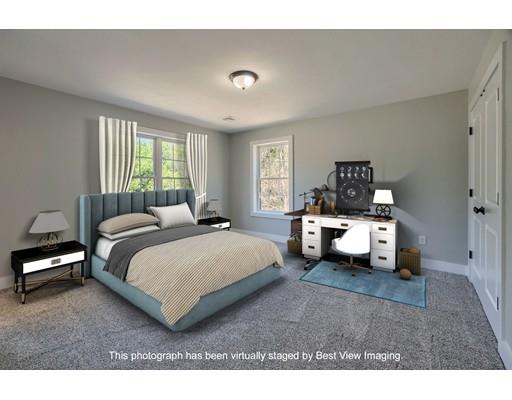 30 Depot Road Ashburnham, MA 01430 - Photo 17 of 30 a spacious bedroom with a bed and a couch