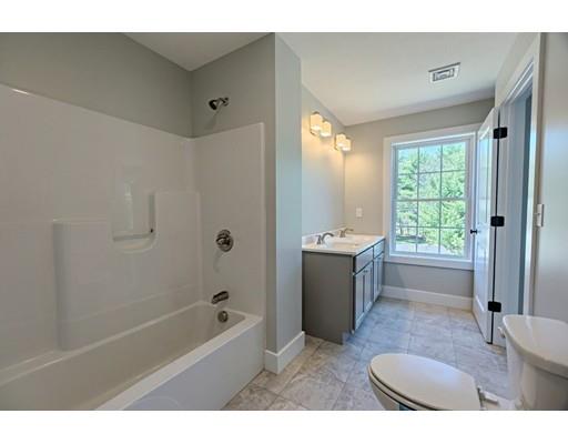 30 Depot Road Ashburnham, MA 01430 - Photo 19 of 30 a bathroom with a granite countertop tub sink and mirror