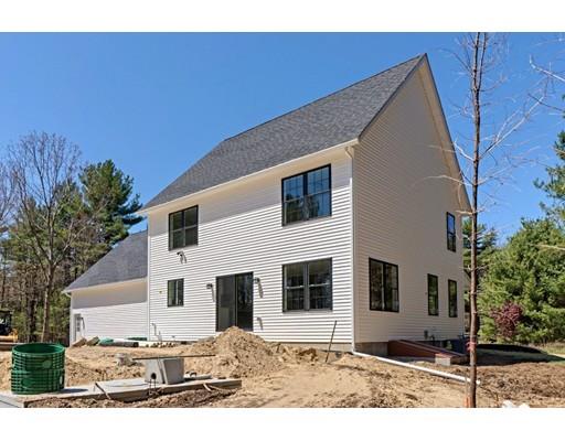 30 Depot Road Ashburnham, MA 01430 - Photo 26 of 30 a black white house with trees in the background