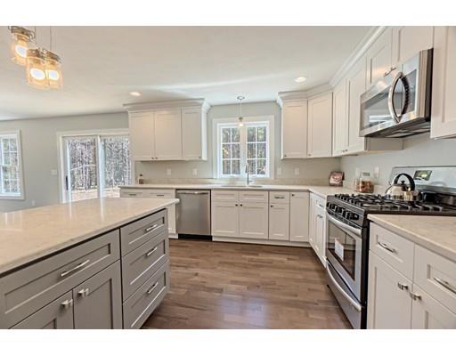 30 Depot Road Ashburnham, MA 01430 - Photo 5 of 30 a kitchen with granite countertop white cabinets stainless steel appliances a sink and a window