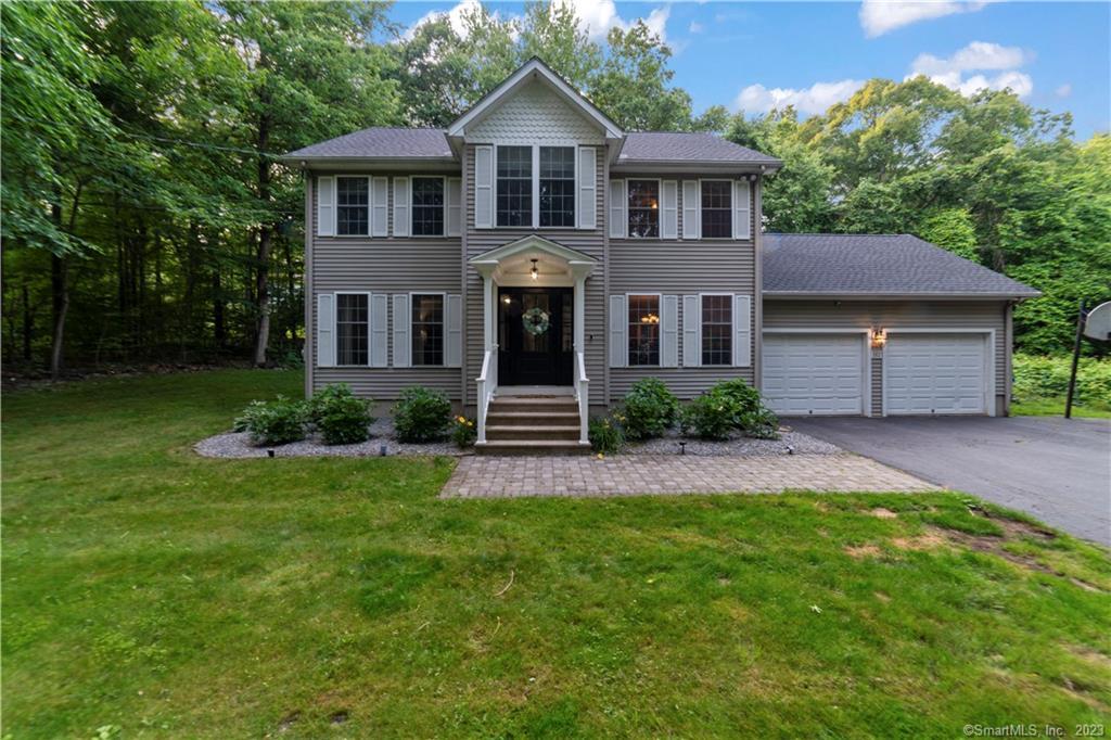 162 Cook Road Prospect, CT 06712 - Photo 1 of 1 a front view of a house with a yard