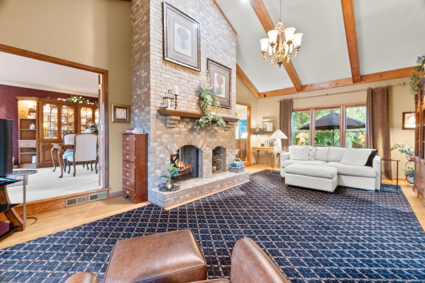 3218 Opengate Road Crystal Lake, IL 60012 - Photo 13 of 60 a living room with furniture and a fireplace