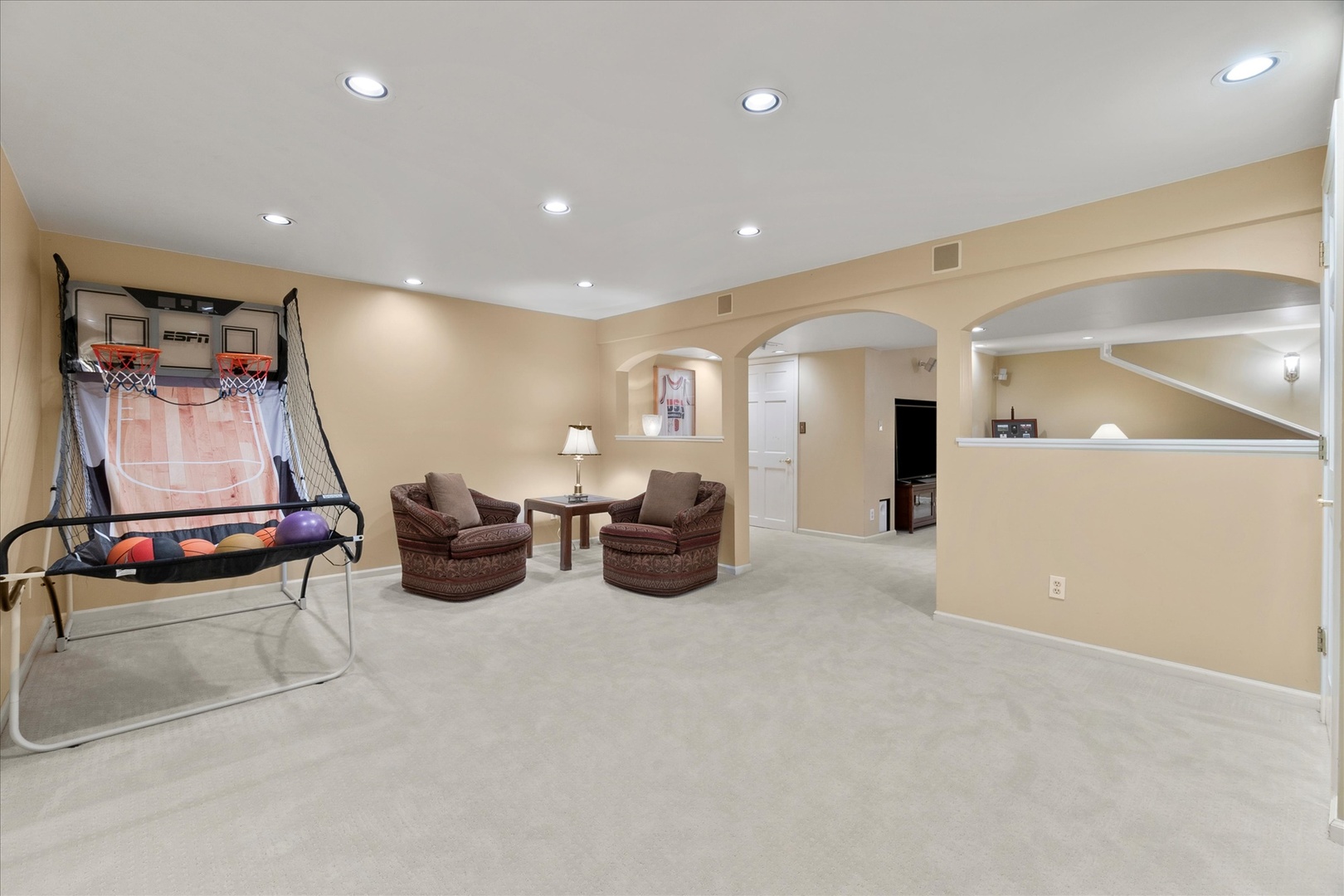 3218 Opengate Road Crystal Lake, IL 60012 - Photo 42 of 60 a living room with furniture and a flat screen tv