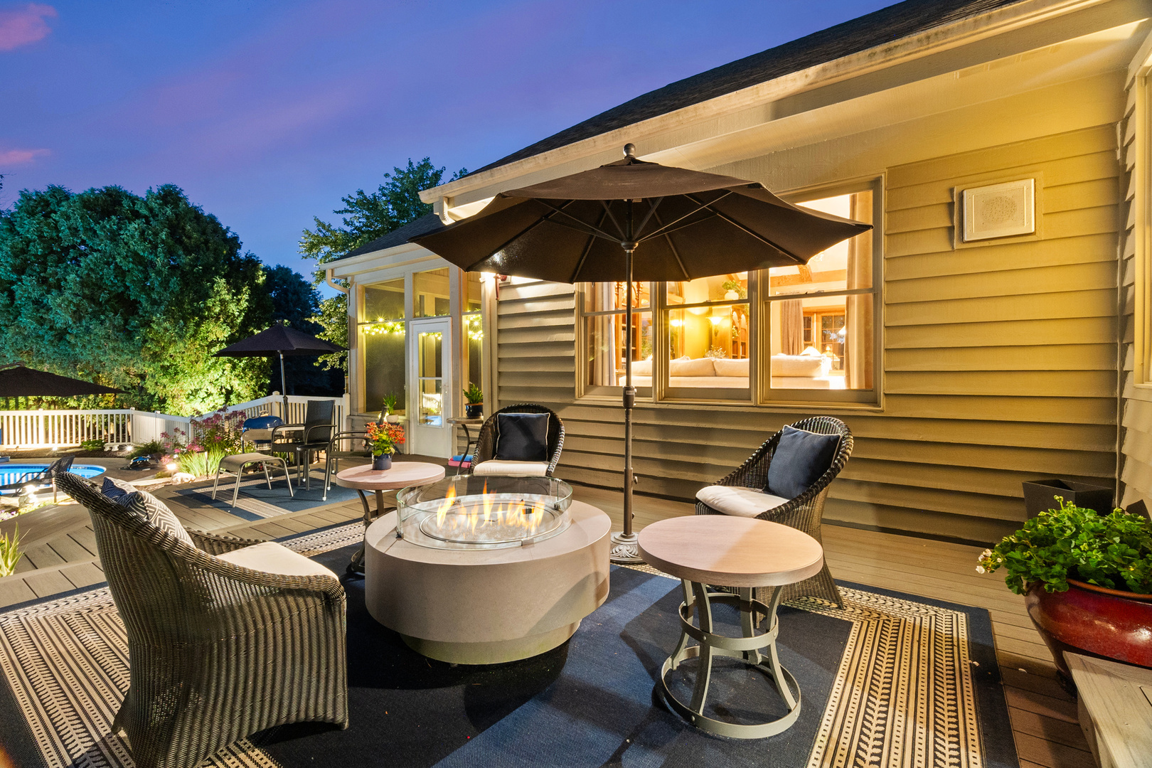 3218 Opengate Road Crystal Lake, IL 60012 - Photo 47 of 60 a view of a patio with table and chairs and potted plants