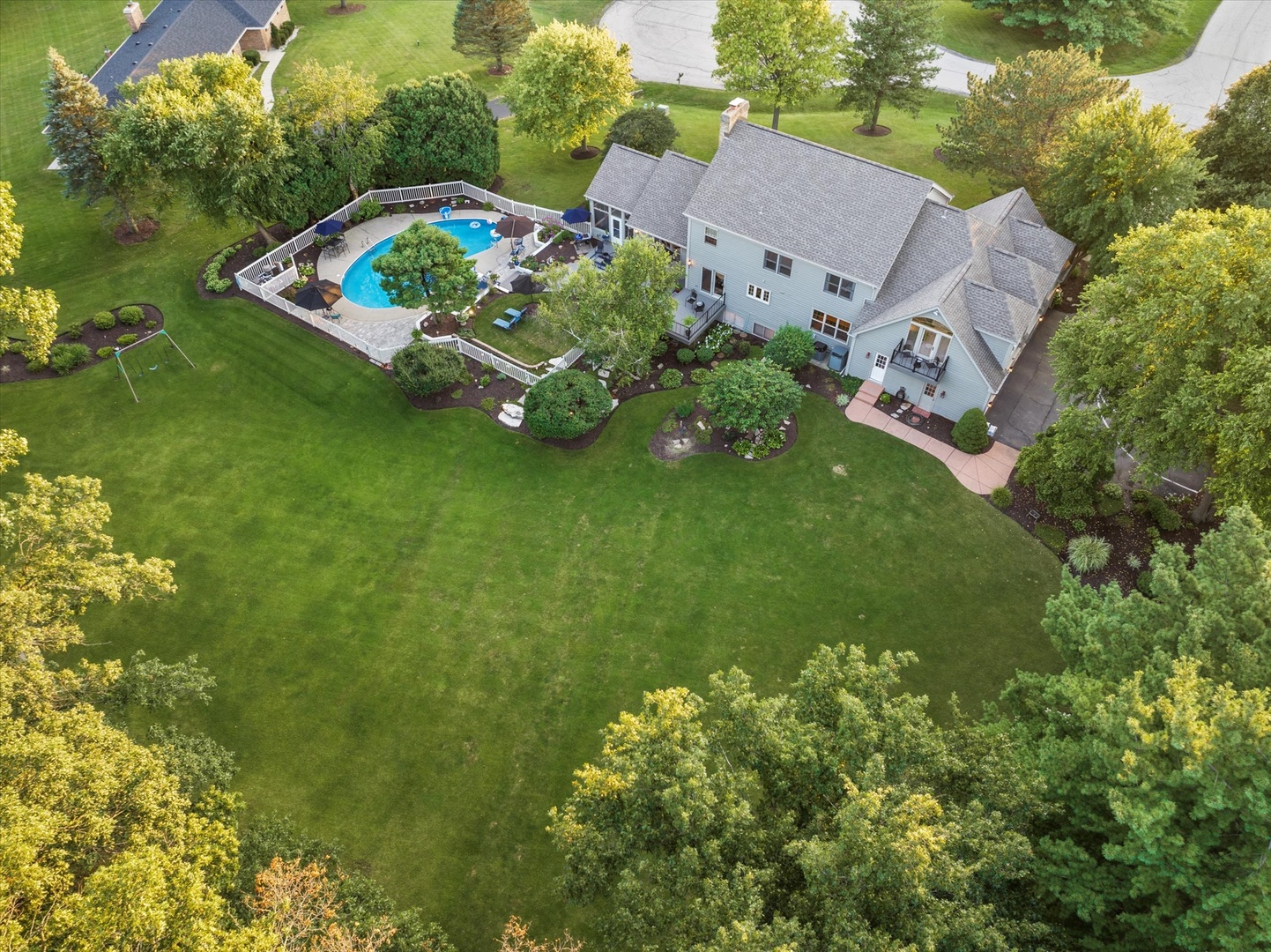 3218 Opengate Road Crystal Lake, IL 60012 - Photo 8 of 60 an aerial view of a house with a yard basket ball court and outdoor seating