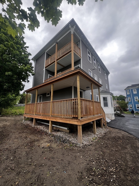 19 Reeves Street Worcester, MA 01607 - Photo 29 of 30 a view of a house with a yard and deck