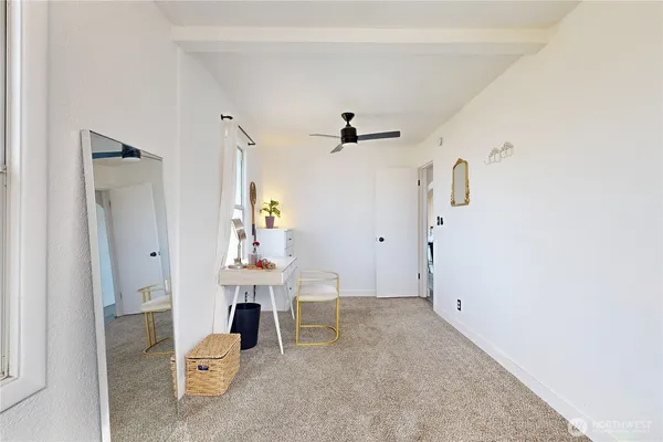 a view of hall way with fireplace