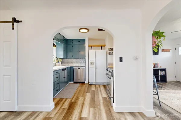 a spacious bathroom with a sink and a mirror