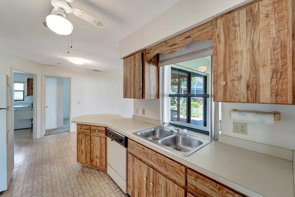 5861 Adams Road Venice, FL 34293 - Photo 20 of 51 Counter space and a convenient Breakfast Bar