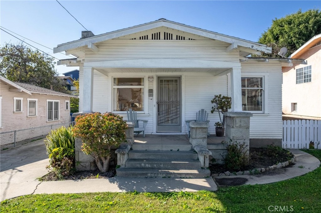659 West 3rd Street San Pedro, CA 90731 - Photo 2 of 38 a view of a house with yard and sitting area