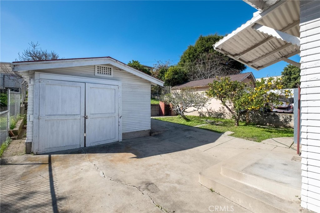 659 West 3rd Street San Pedro, CA 90731 - Photo 26 of 38 a view of a house with a garage