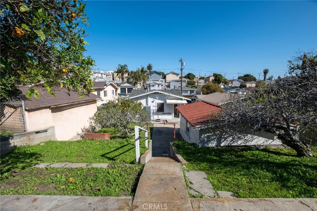 659 West 3rd Street San Pedro, CA 90731 - Photo 31 of 38 a picture of houses with outdoor space